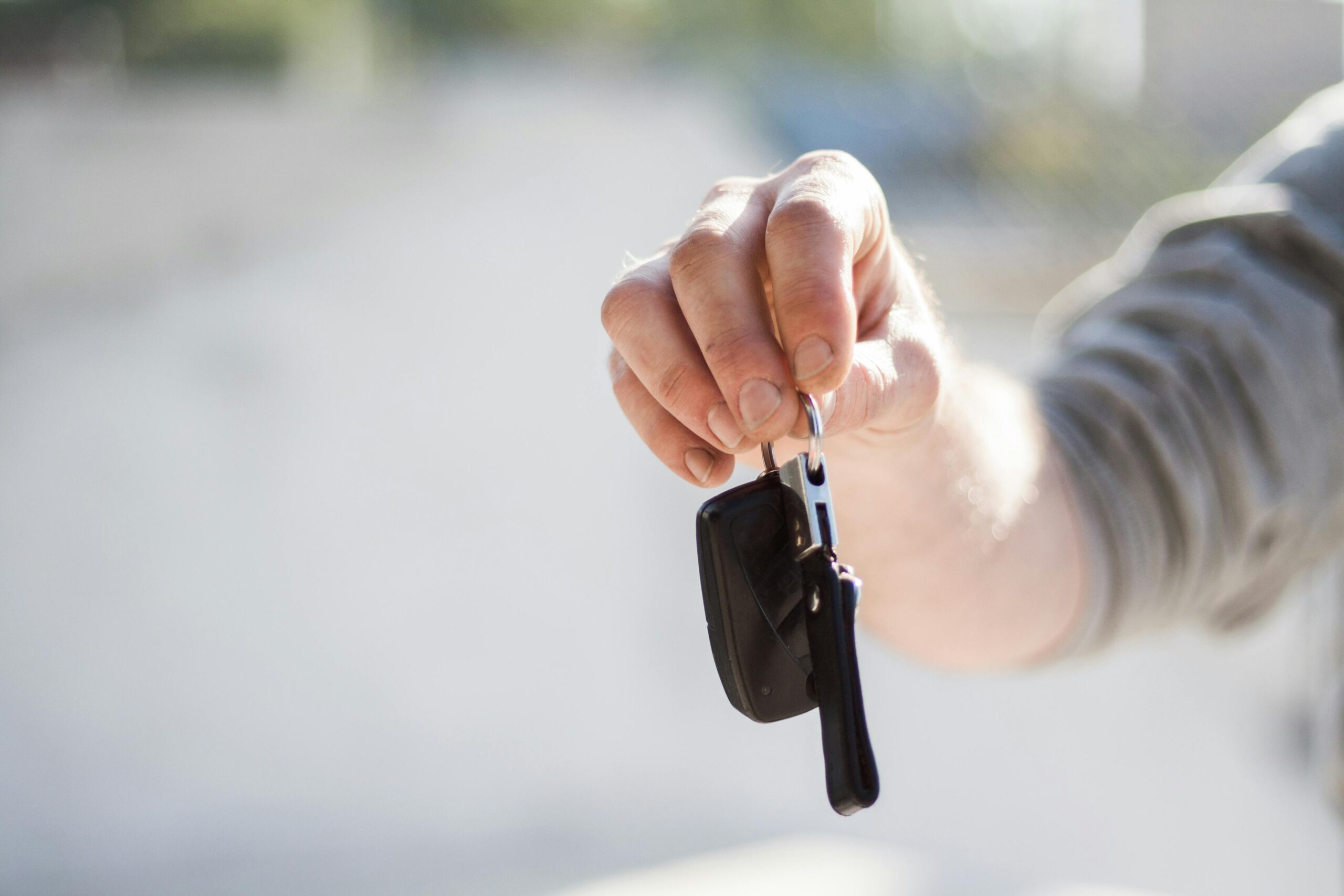 Photo by Negative Space: https://www.pexels.com/photo/person-in-grey-shirt-handing-keys-97079/