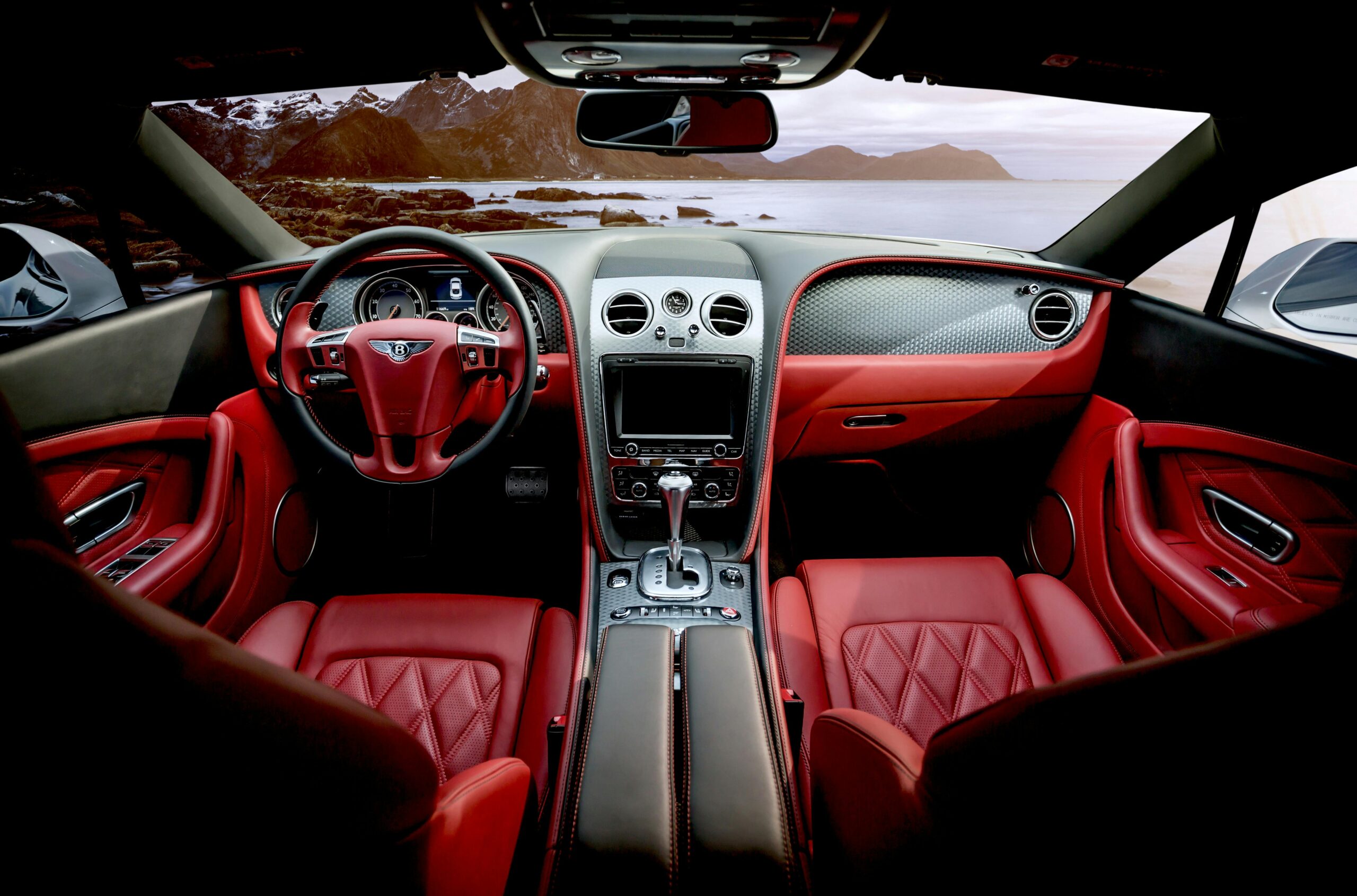 Photo by Pixabay: https://www.pexels.com/photo/car-with-red-interior-326259/